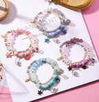 Crystal Bracelet with Star, Moon, and Cat Eye Design
