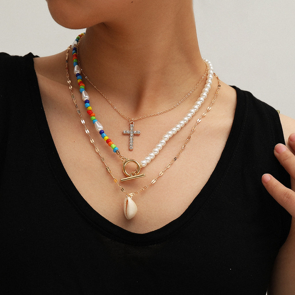 Fashionable Asymmetrical Shell Bead Cross Necklace
