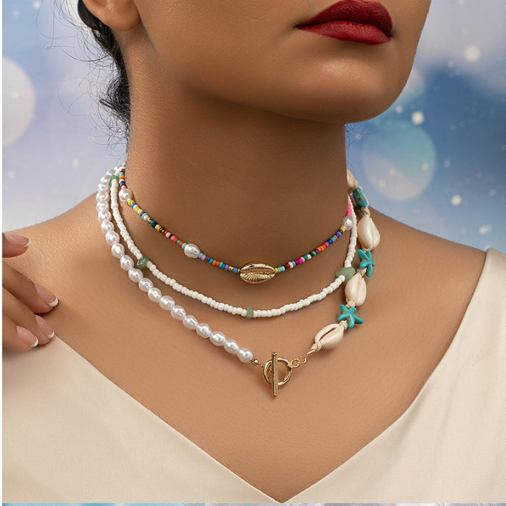 Fashionable Asymmetrical Shell Bead Cross Necklace