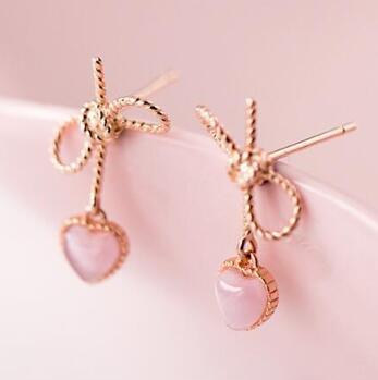 Silver Bow Earrings with Pink Cat Eye Heart Drop