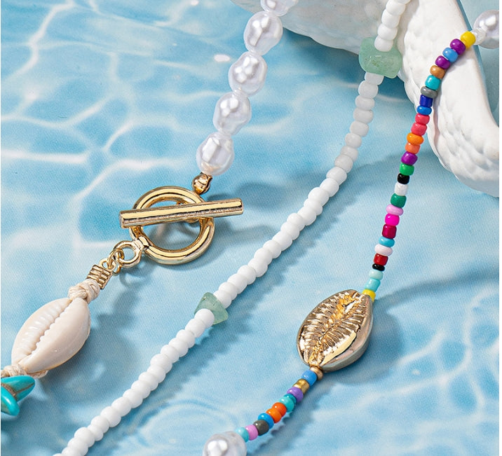 Fashionable Asymmetrical Shell Bead Cross Necklace